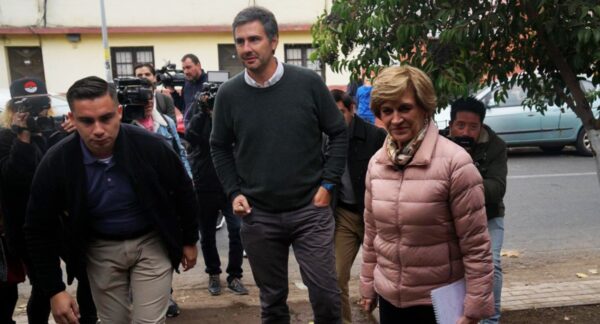 Evelyn Matthei y su efe de campaña, Diego Paulsen.
