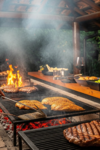 Hombre haciendo una parrillada con lomo vetado.